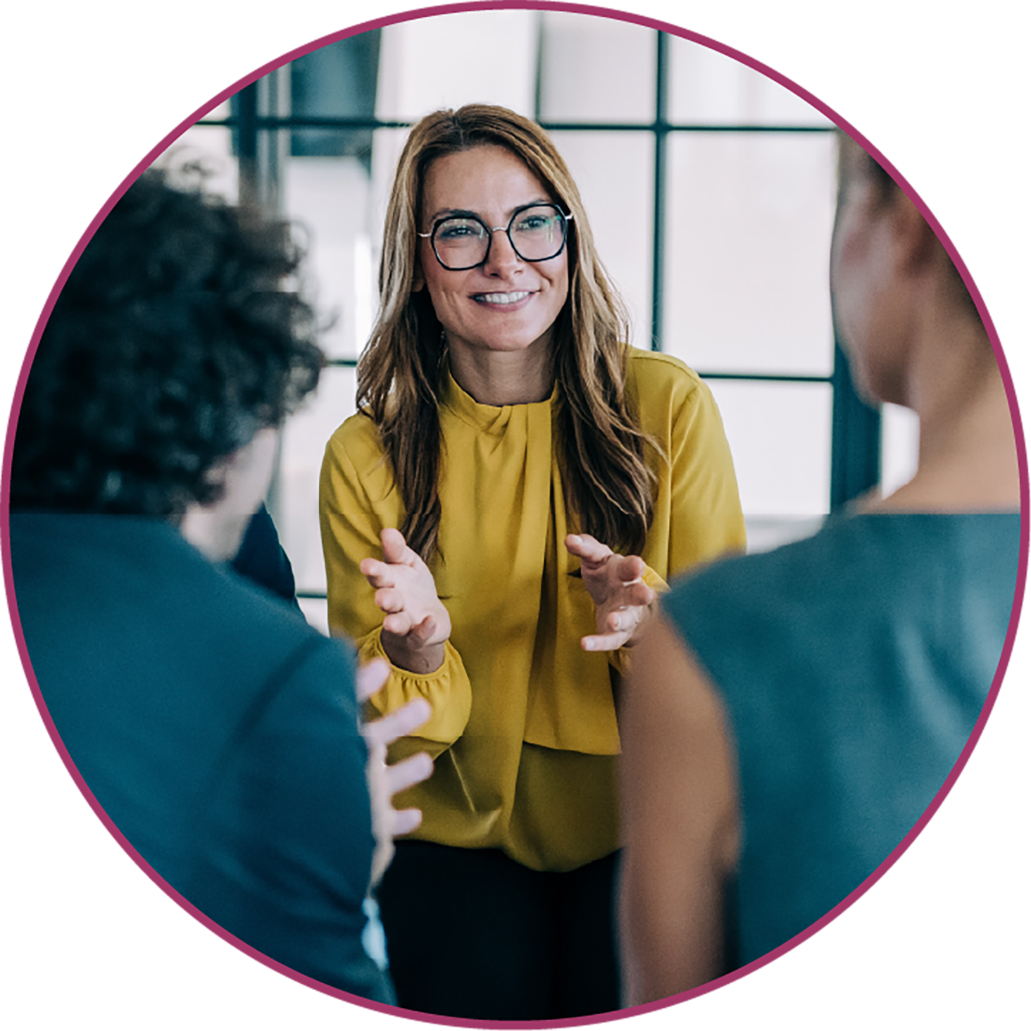 woman smiling and waving her hands